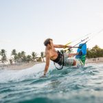 riding waves kiteboarding