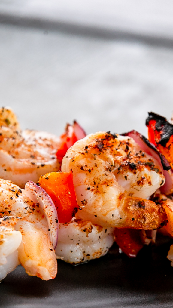 Closeup of grilled shrimp pinchos or kebabs