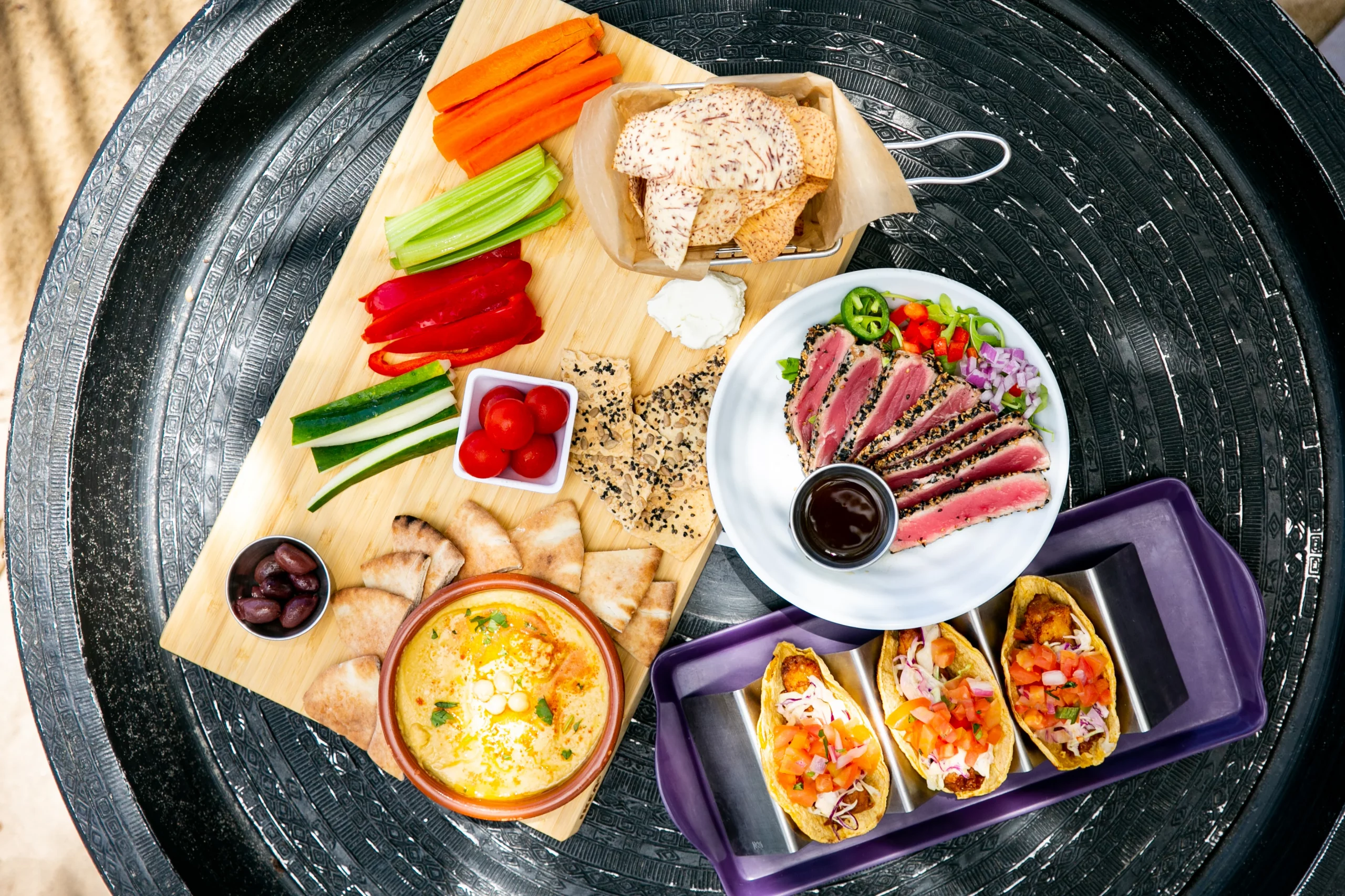 a tray with various dishes offered at numero uno beach house