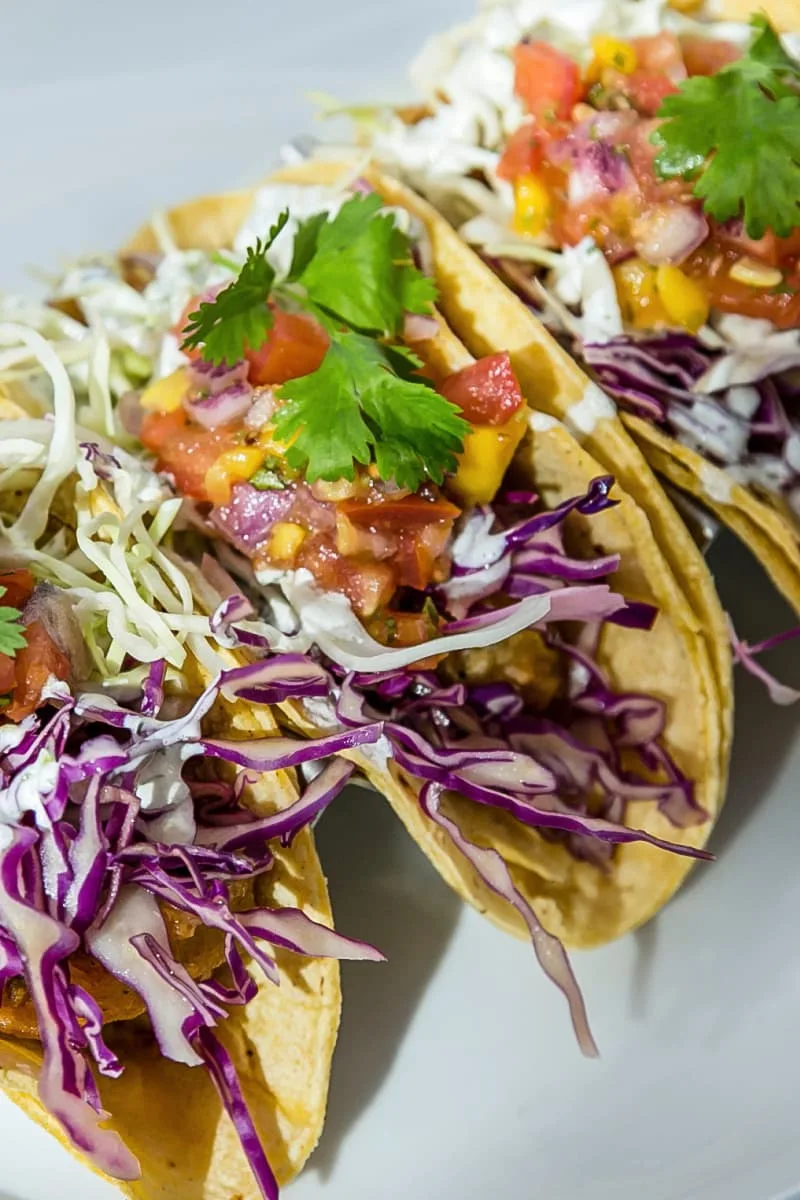 a plate of fish tacos